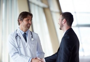 Doctor handshake with a patient